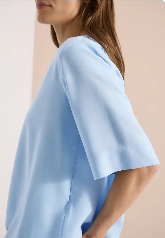 Blouse avec col fendu et ourlet élastique light sky blue