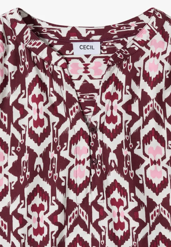 Damenbluse mit pink-weißem Ikat-Muster, V-Ausschnitt und lockerem Schnitt von CECIL.