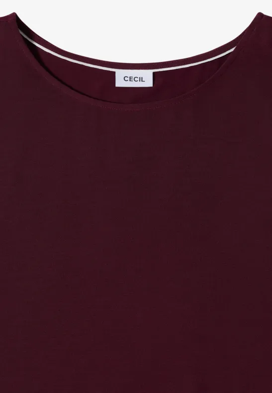 Ein schlichtes, dunkelrotes, kurzärmeliges T-Shirt mit rundem Halsausschnitt und Label 'CECIL'.