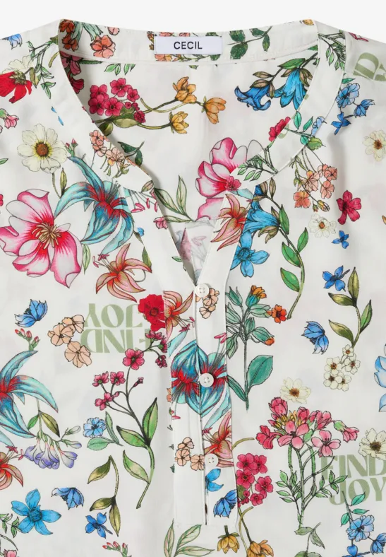 Chemisier blanc à imprimé floral coloré avec patte de boutonnage