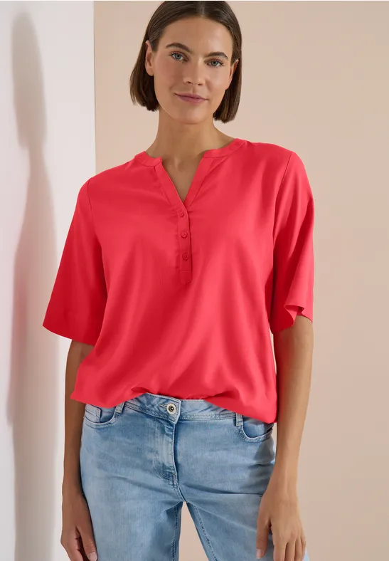 Blouse met korte mouwen en gespleten hals coral