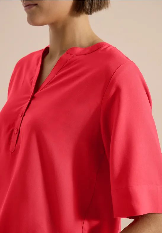 Blouse met korte mouwen en gespleten hals coral