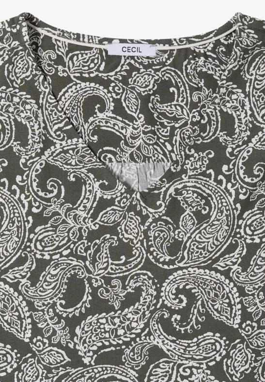 Donkergrijs topje met witte paisley-print en V-hals.