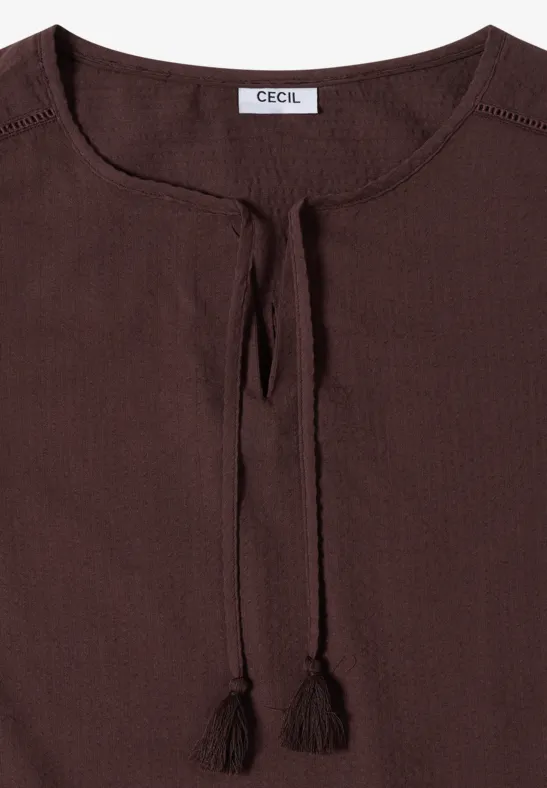 Braune Bluse mit Rundhalsausschnitt, Tunnelzug und Quasten, lässiger Stil.