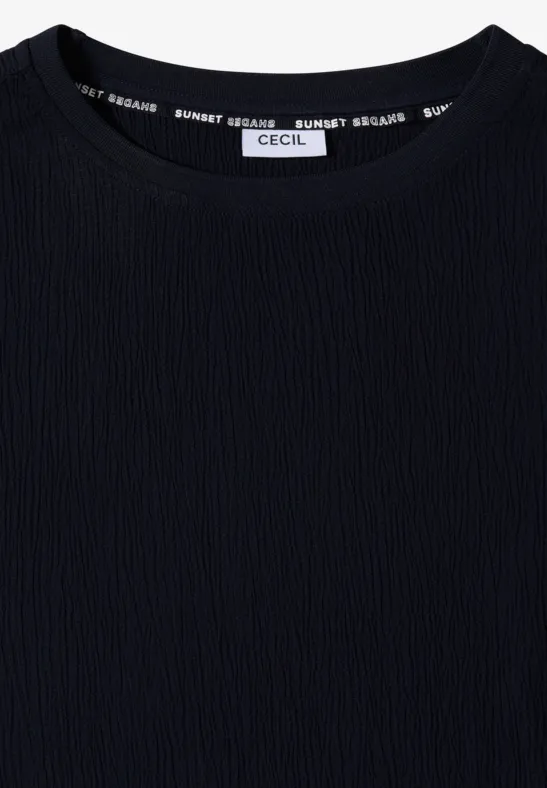 T-shirt noir CECIL à col rond avec texture côtelée légère.