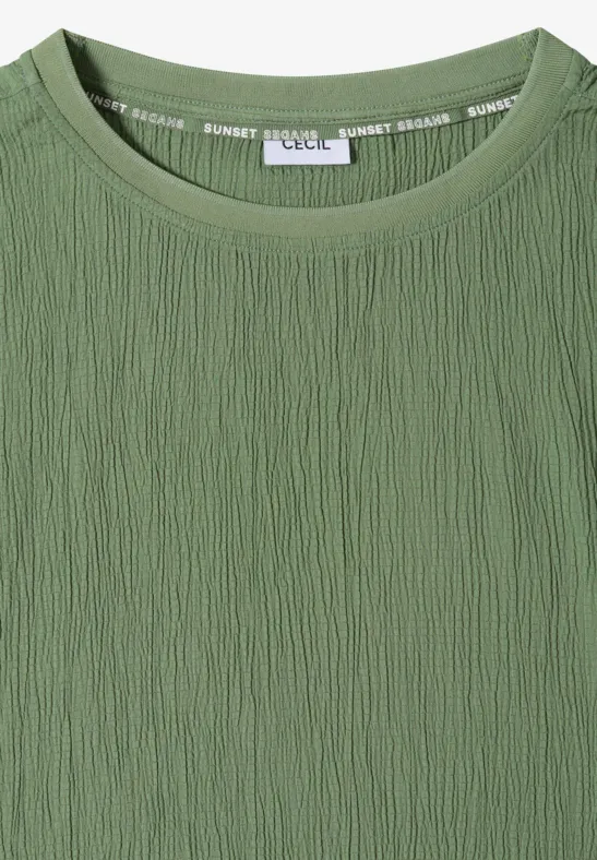 Groen T-shirt met ronde hals en fijne plooienstructuur.