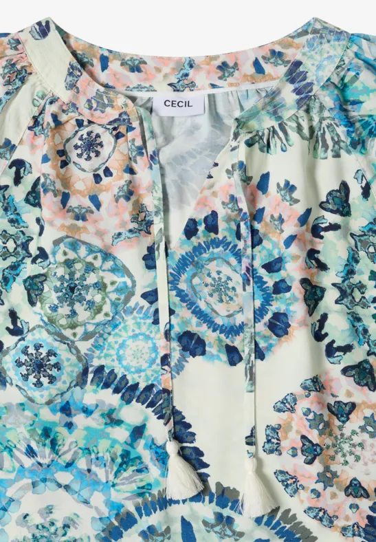 Blouse légère pour femme avec motif floral mandala coloré et coupe ample.