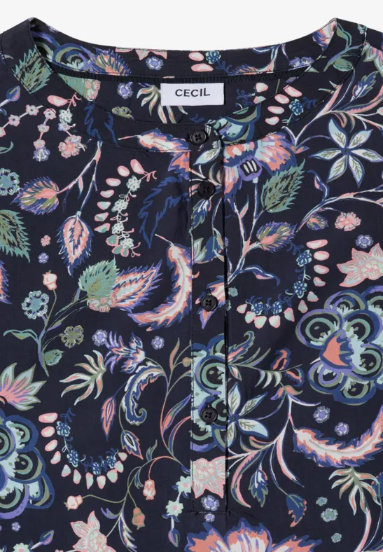 Dunkle Bluse mit buntem Blumenprint und Rundhalsausschnitt.