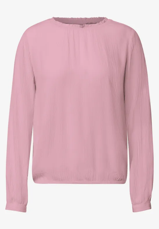 rosa Bluse mit langen Ärmeln, rundem Ausschnitt und schlichtem Design