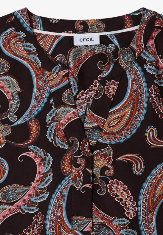 Mouwloze top met kleurrijk paisley-print op zwarte achtergrond.