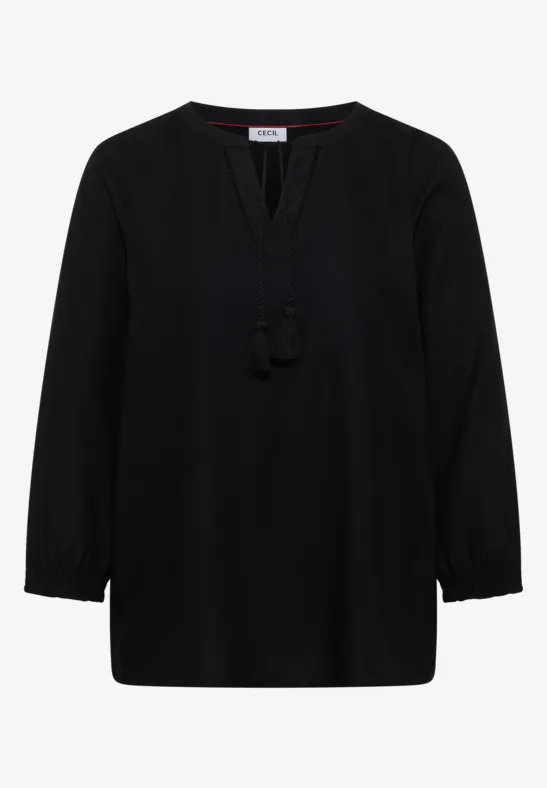 Schlichte schwarze Bluse mit V-Ausschnitt, lockerem Schnitt und lässigen Quasten am Ausschnitt.