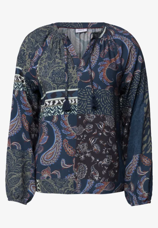 Damenbluse mit langem Arm und Patchwork-Paisley-Muster in Blau, Dunkelgrün und Orange.