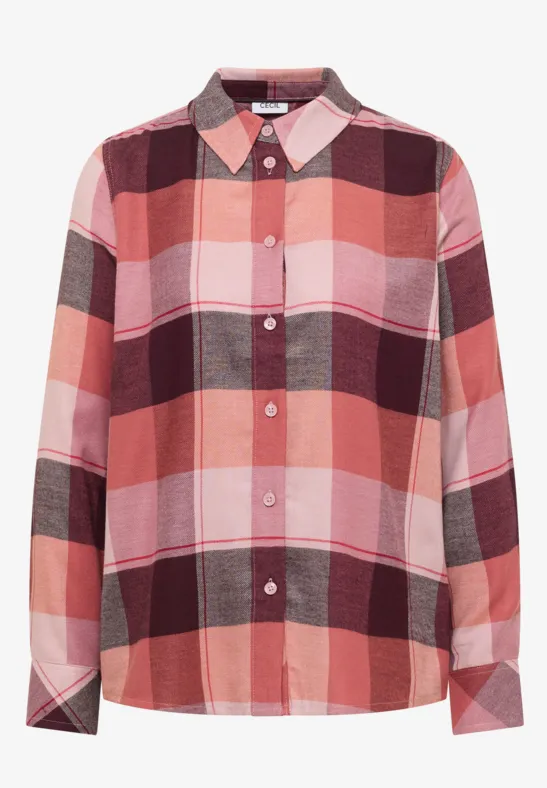 Chemise à manches longues à carreaux rouges, roses et bordeaux avec boutons.