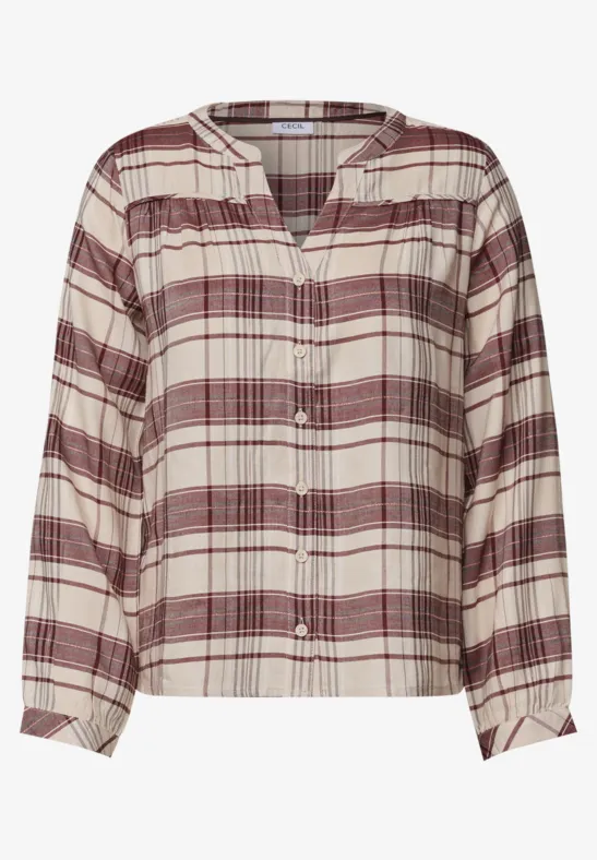 Chemise à carreaux blanc, rouge et gris, manches longues et patte de boutonnage.