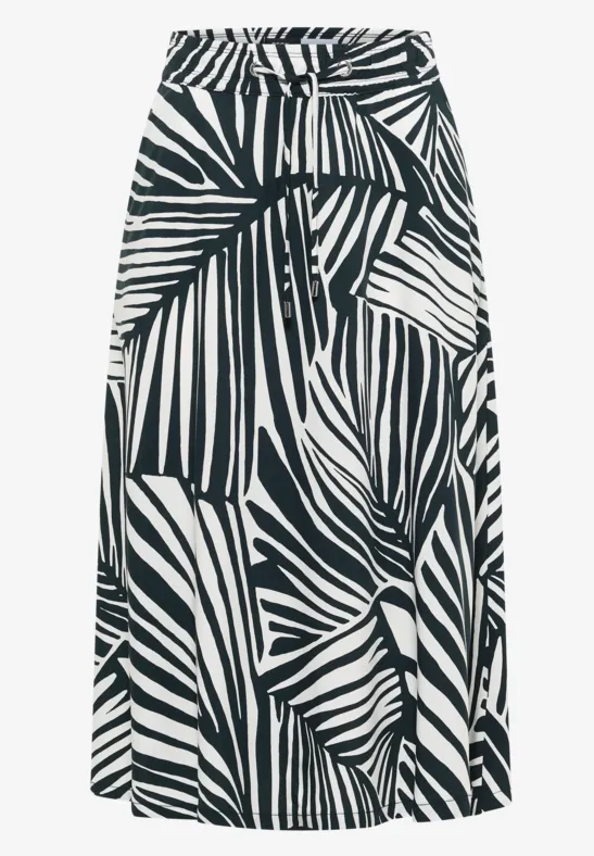 Zwart-witte midirok met palmbladprint en hoge taille.