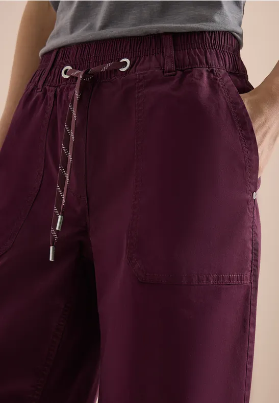 Paarse joggingbroek met trekkoord, elastische taille en zijzakken