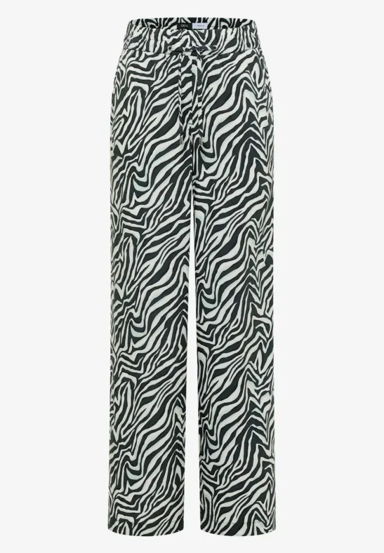Pantalon ample à motif zébré noir et blanc avec ceinture à cordon.