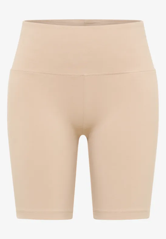 Beige, nahtlose High-Waist-Shorts aus elastischem Material, figurformend.