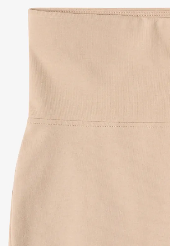 Beige, hoch taillierter Shapewear-Slip aus elastischem, glattem Stoff.