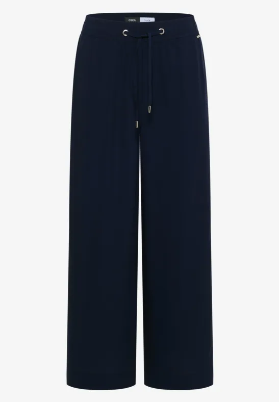 Dunkelblaue, weite Hose mit elastischem Bund und Kordelzug.