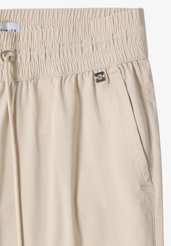 Spodnie z wąskimi nogawkami Mid Waist w stylu Casual Fit. grain beige