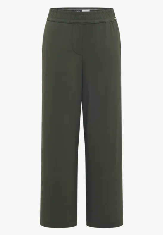 Grüne, locker sitzende Hose mit weitem Bein und elastischem Bund.