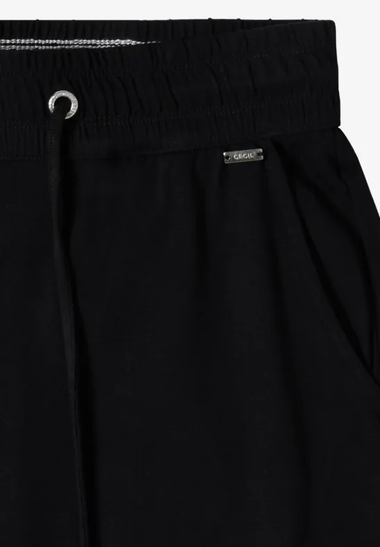 Schwarze Jogginghose aus Baumwollmix mit elastischem Bund, Tunnelzug und seitlichen Eingrifftaschen.