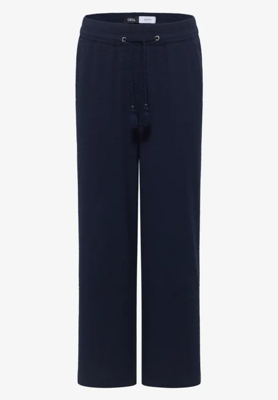 Donkerblauwe loungebroek met wijde pijpen en aantrekkoorde in de taille.