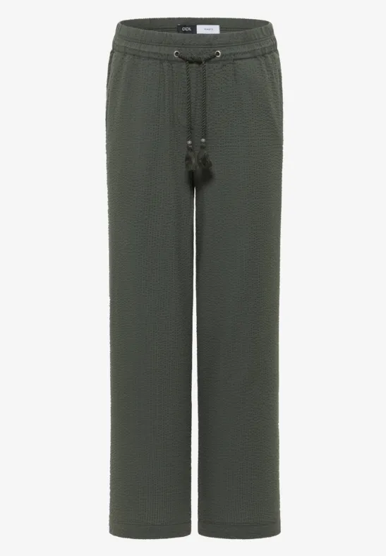 Donkergroene rechte broek van textuurstof, elastische taille met koord en kwastjes.