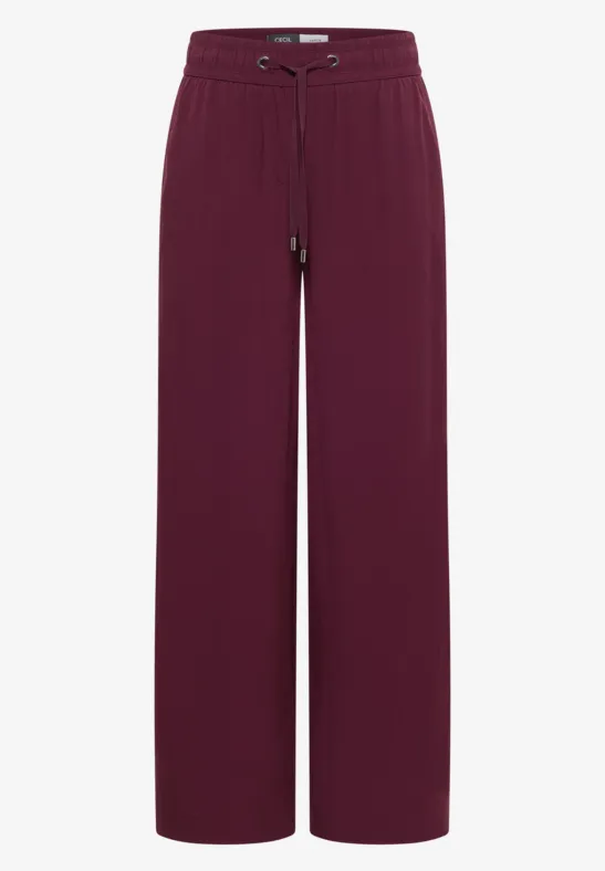 Burgunderrote, locker geschnittene Stoffhose mit hohem Bund und Tunnelzug, weitem Bein.