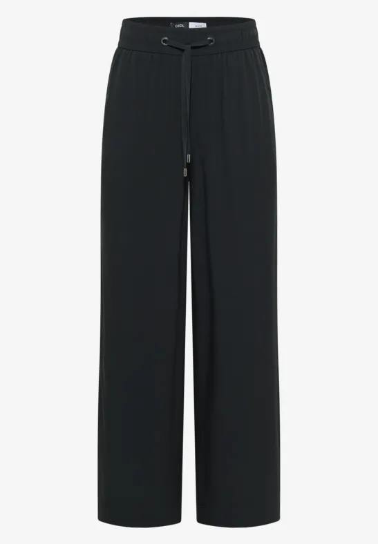 Schwarze, weite Damenhose mit hohem Bund, Gürtelzug und geradem Bein.