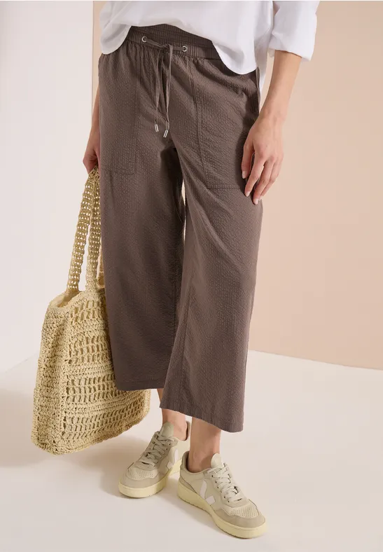Braune, weite Damenhose mit hohem Bund und Kordelzug