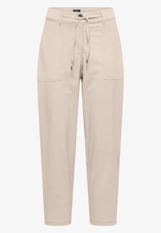 Beige Paperbag-Hose mit hohem Bund, weitem Bein und Tunnelzuggürtel.