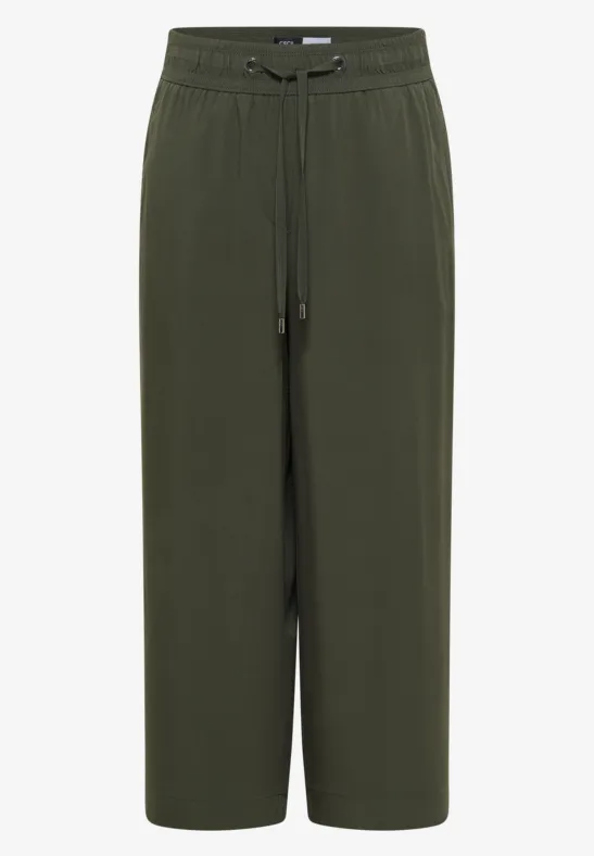 Pantalon ample kaki coupe large et raccourcie, taille élastique avec cordon.