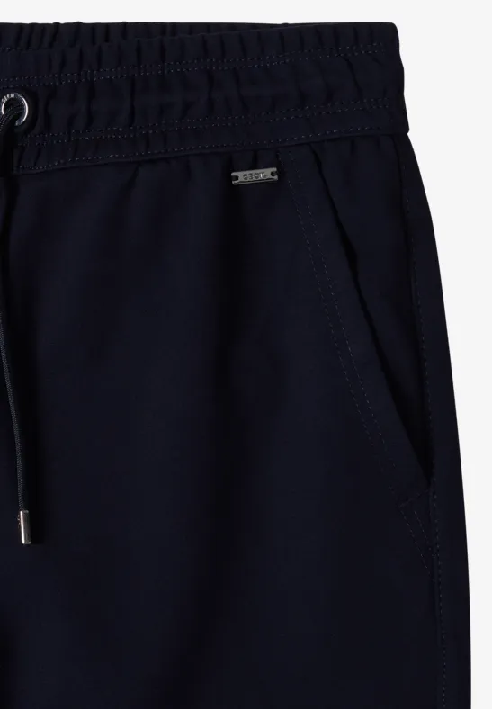 Pantalon de jogging bleu marine à taille élastique, poche latérale et cordon de serrage à embouts métalliques.