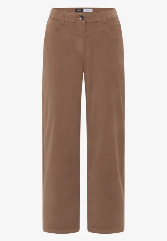 Pantalon en velours côtelé marron, coupe ample et taille haute.