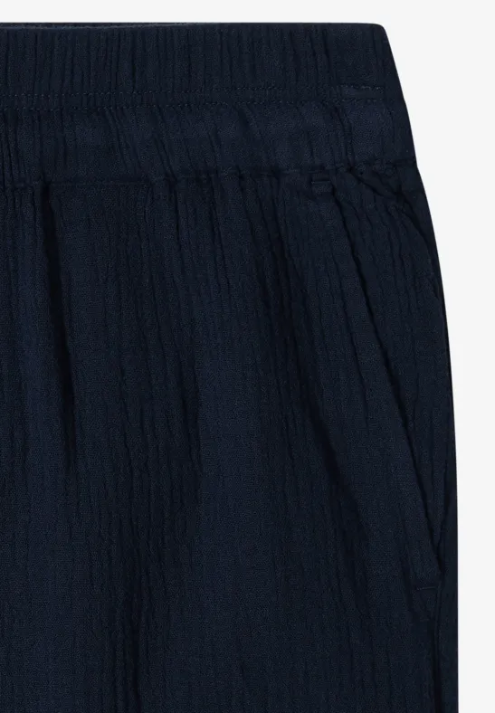 Marineblauwe broek met elastische taille en zijzak