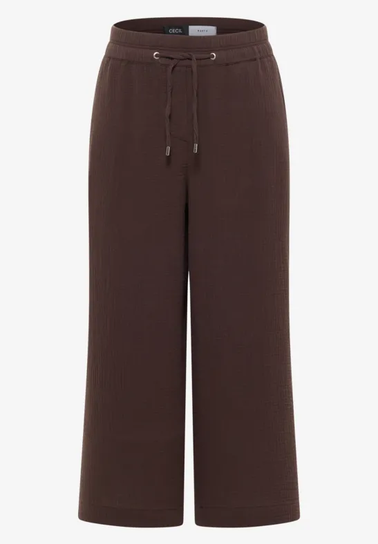 Braune, weite Strickhose mit Tunnelzugbund und 7/8-Länge.