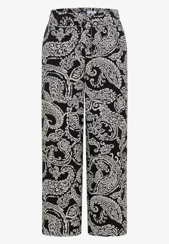 Zwarte, wijdvallende broek met wit paisley bloemenpatroon