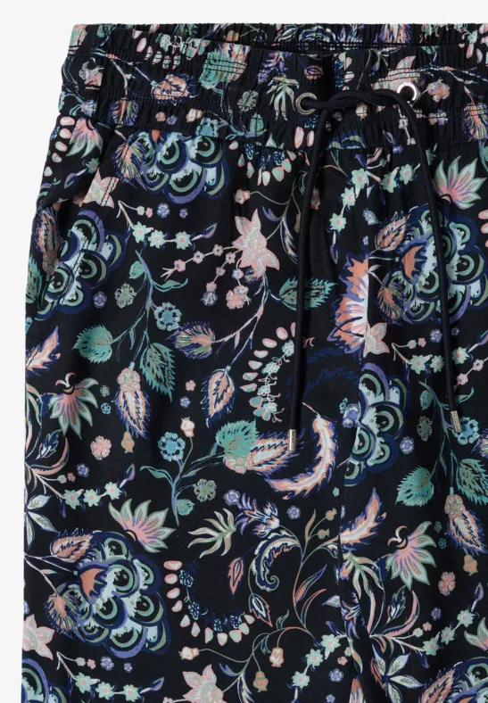 Navyblaue Stoffhose mit buntem, verspieltem Blumenmuster und elastischem Bund mit Kordel
