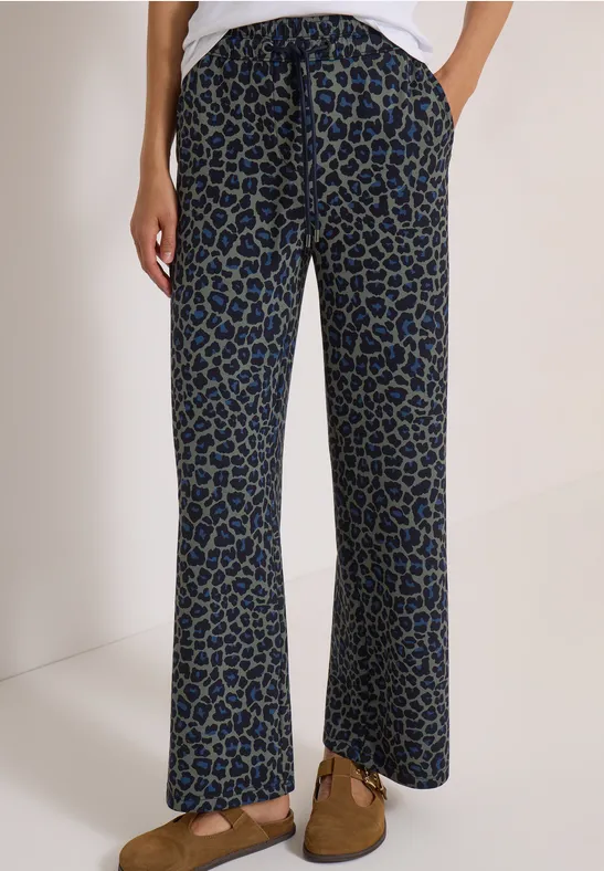 Pantalon fluide femme à motif taches bleu et noir, taille haute et coupe décontractée.