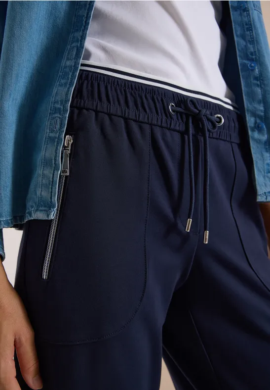 Navyblaue Jogginghose mit elastischem Bund, Kordelzug und Reißverschlusstaschen