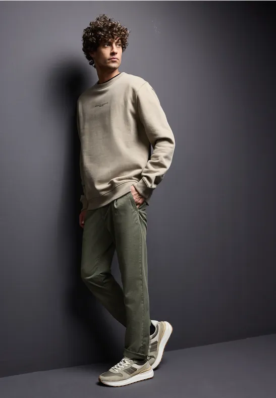 Spodnie chinos o kroju Relaxed Fit deep olive green