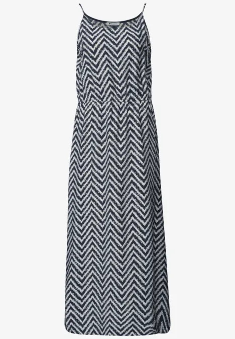 Ärmelloses Maxikleid mit schmalen Trägern und schwarz-weißem Zickzackmuster.