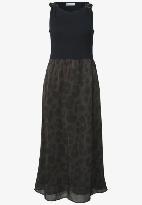 Mouwloze maxi-jurk met zwart bovenstuk en donkergroene, luipaardprint chiffon rok.