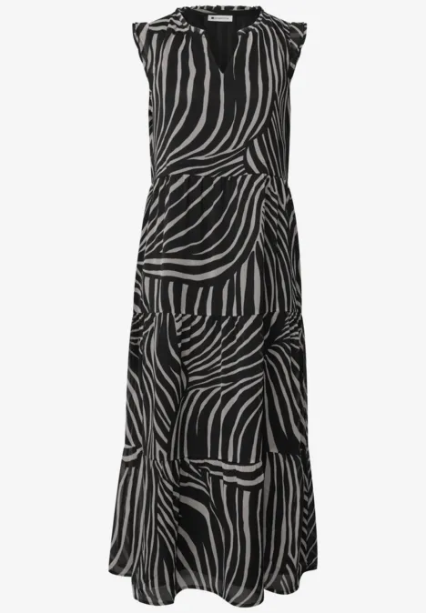 Robe longue sans manches motif zébré noir et blanc avec jupe fluide.