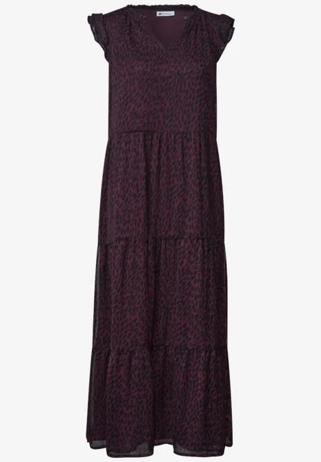 Robe longue fluide à manches courtes avec imprimé léopard discret et jupe à volants étagés.