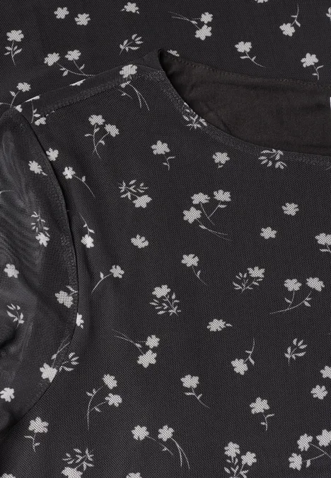 T-shirt noir orné de délicats motifs floraux blancs