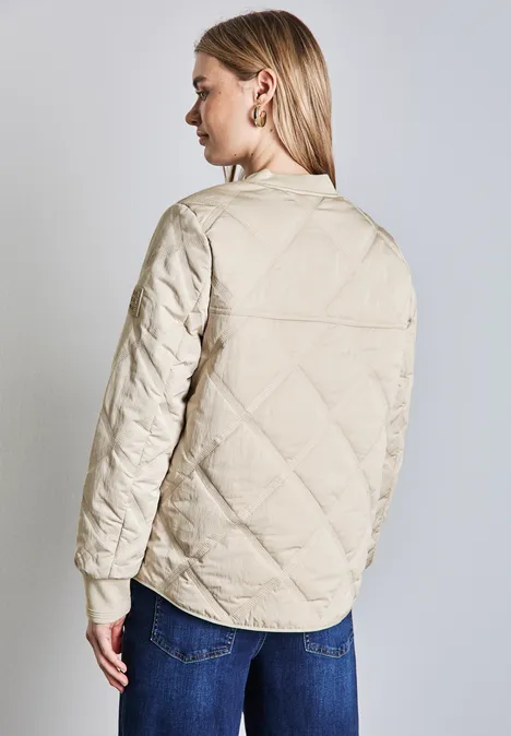 Blouson met doorgestikt patroon pearly sand