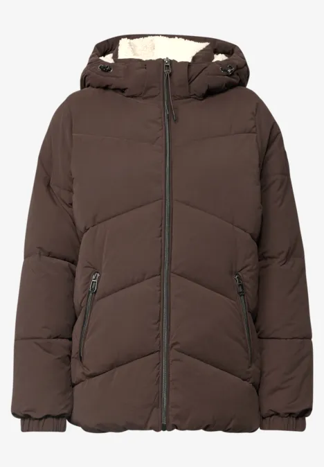Puffer Jacke mit Teddyfutter in der Kapuze auburn brown Braune wattierte Winterjacke mit Kapuze, Reißverschluss, seitlichen Taschen und elastischen Bündchen.